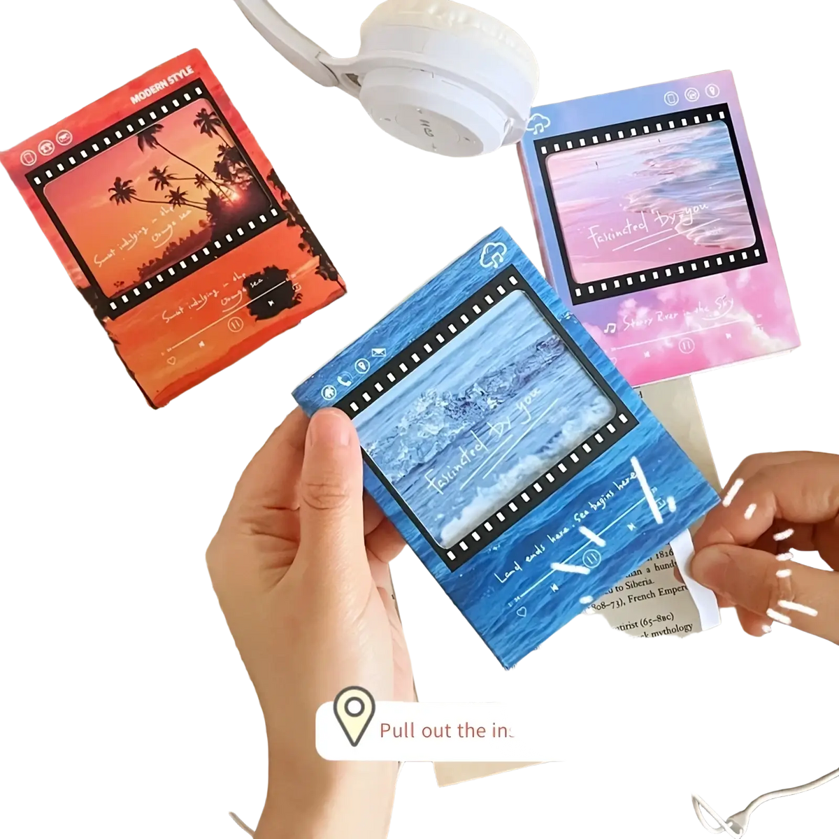 Vintage filmstrip cassette music greeting card featuring a blue tape with ocean scene and white text design