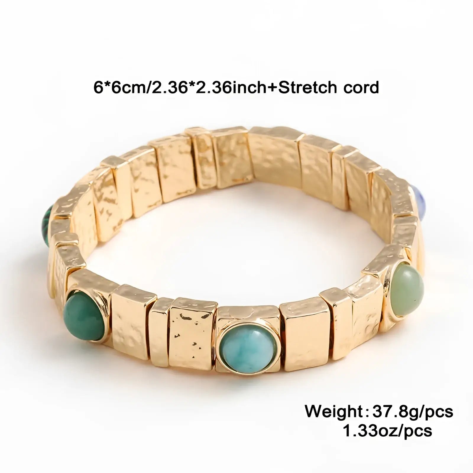 Vintage hammered gold bangle with gold-toned stretch links and turquoise oval stones in gold bezels
