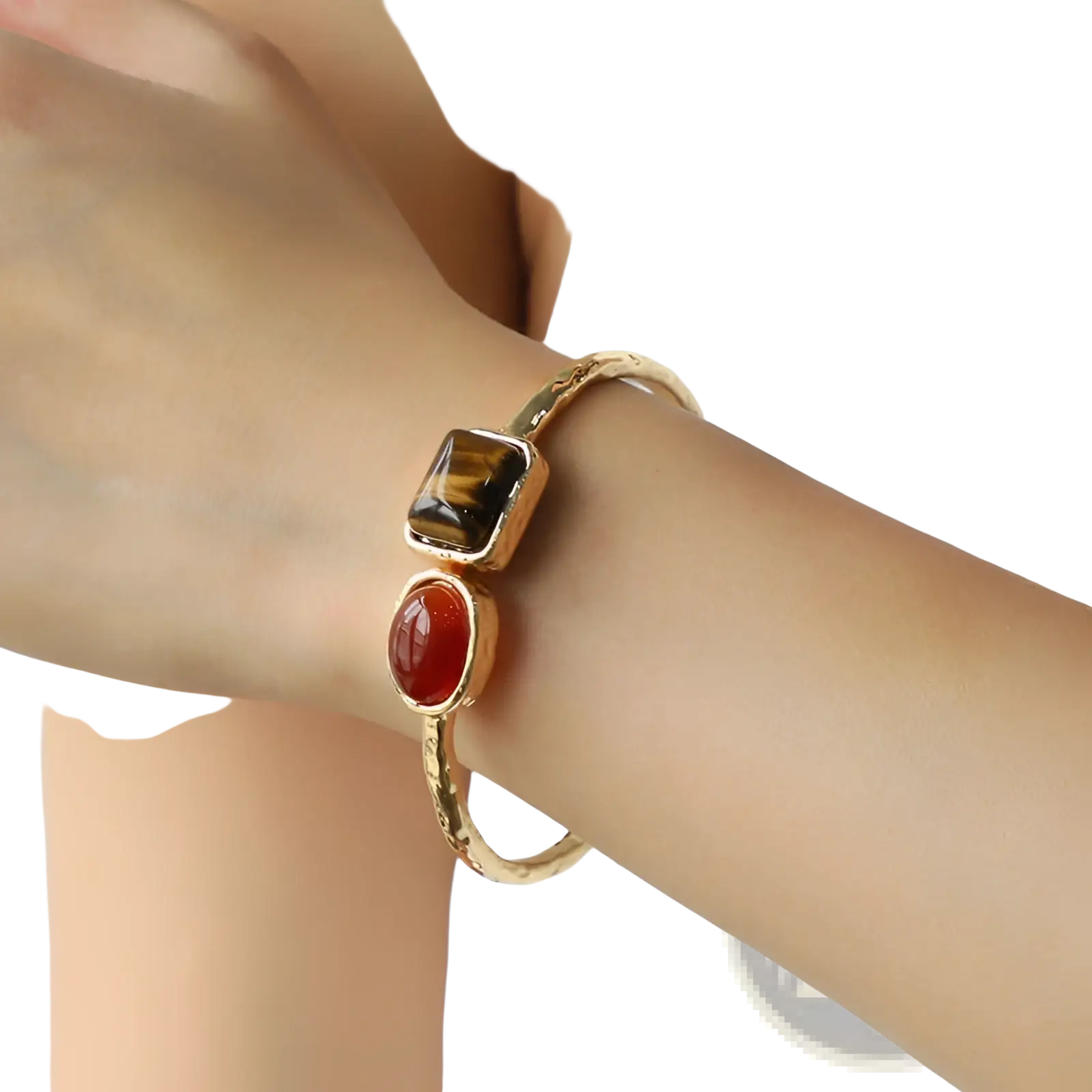Vintage hammered gold bangle bracelet with a textured band featuring square tiger’s eye and oval carnelian gemstones