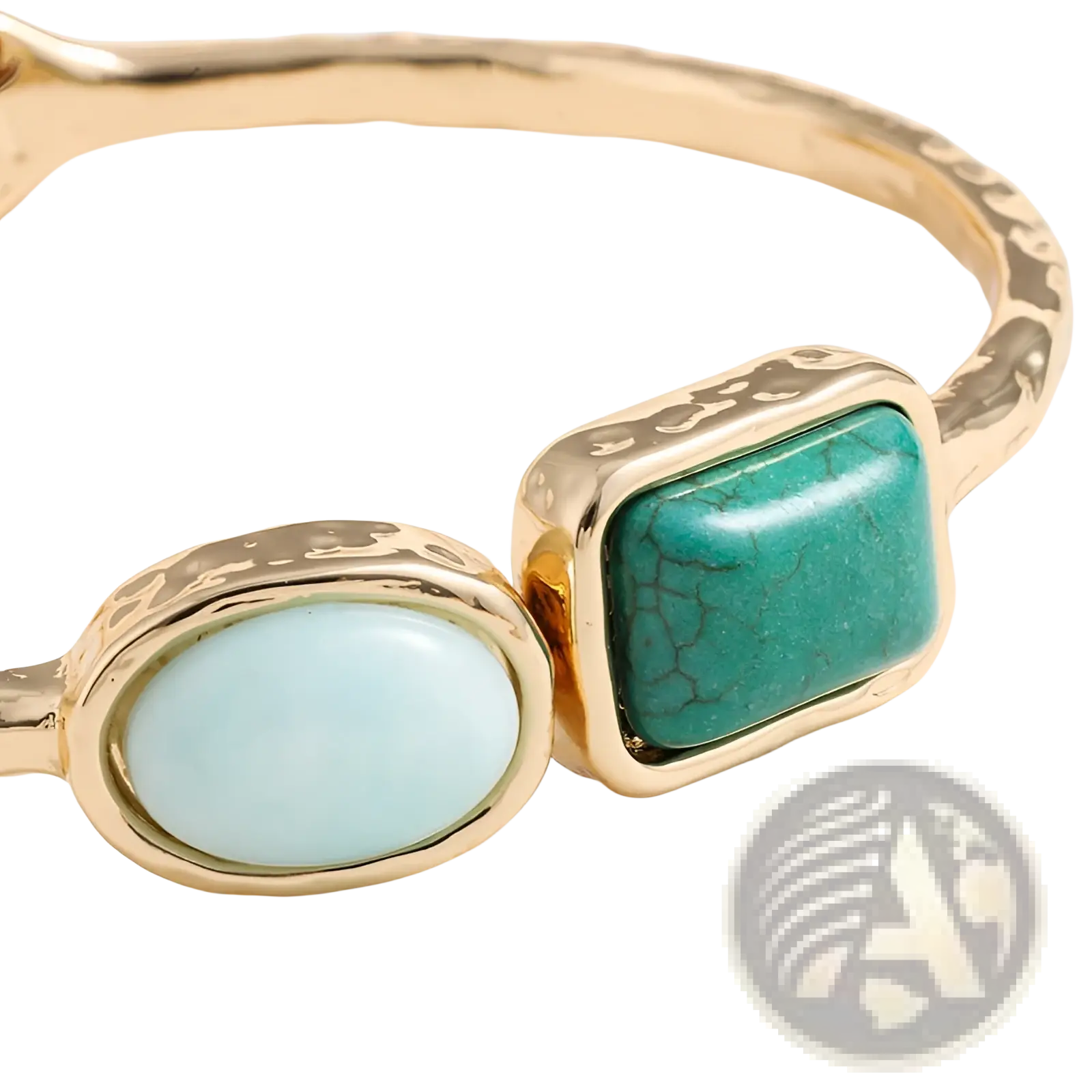 Vintage hammered gold bangle featuring a light blue oval stone and a teal rectangular turquoise with crackle patterns