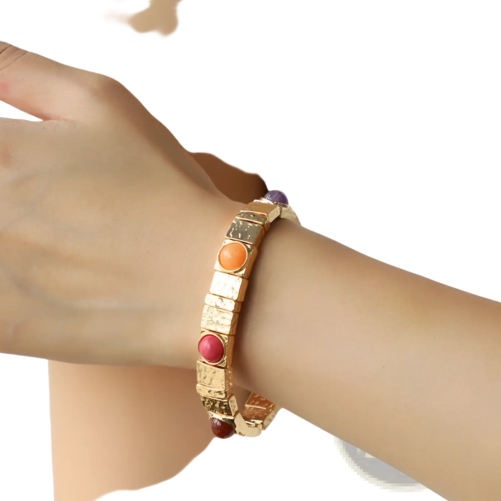 Vintage hammered gold rectangular bangle bracelet with orange red and purple gemstone accents
