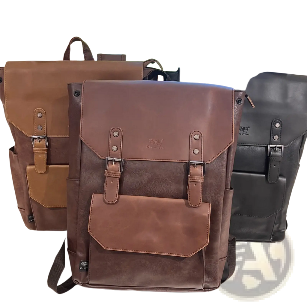 Brown leather vintage college backpack with two-tone tan and dark brown panels and silver metal buckles for travel use