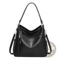 Black leather vintage tote bag with a sleek structured design and multiple zippers for secure storage