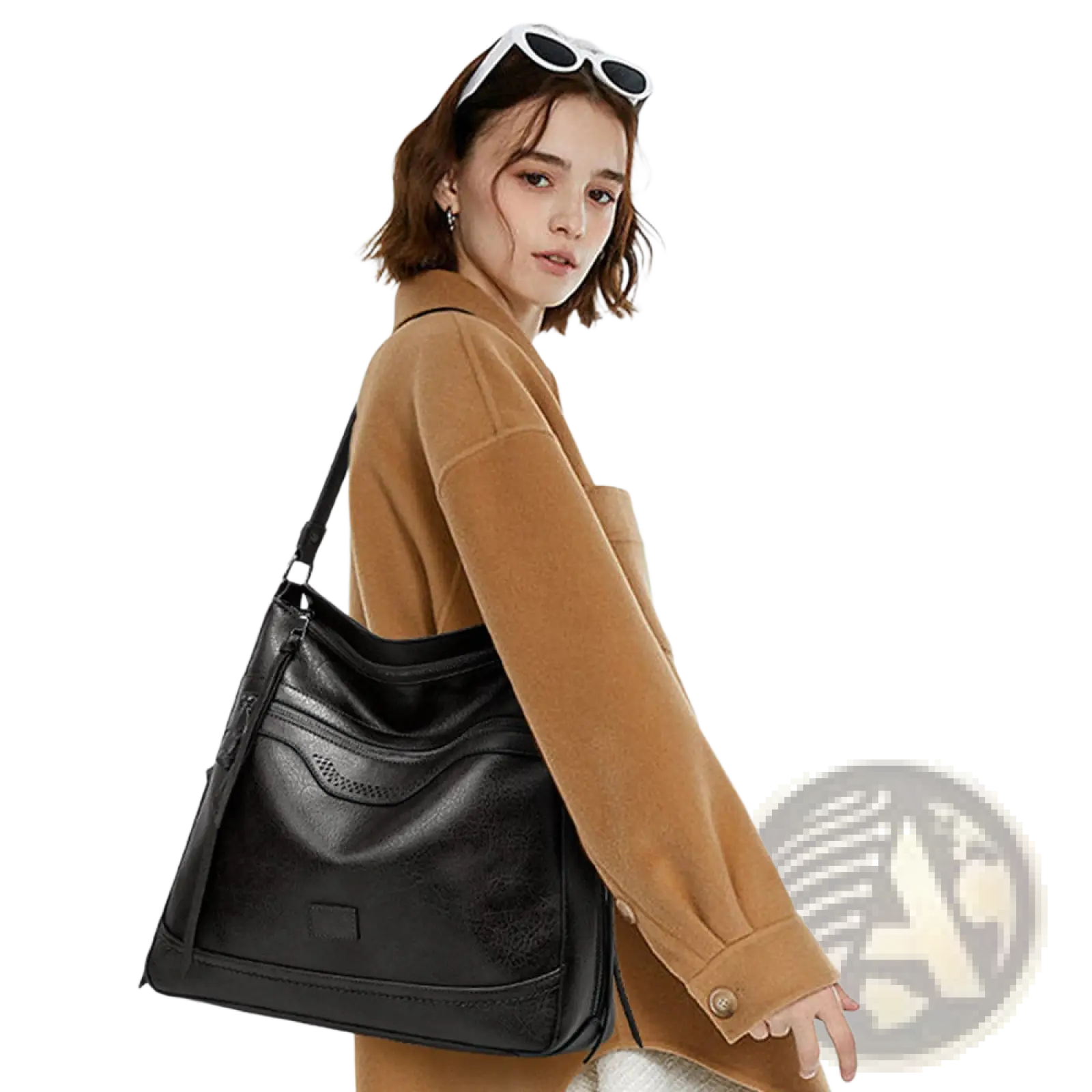 Black leather vintage tote bag with textured surface and subtle perforated detailing multi pocket shoulder purse