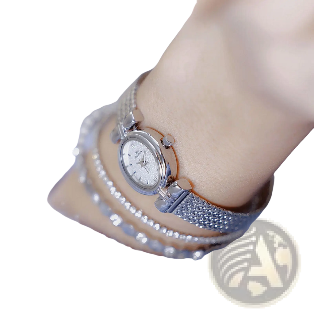 Vintage silver mesh bracelet watch with a sparkling diamond-encrusted face and clasp for elegant wear