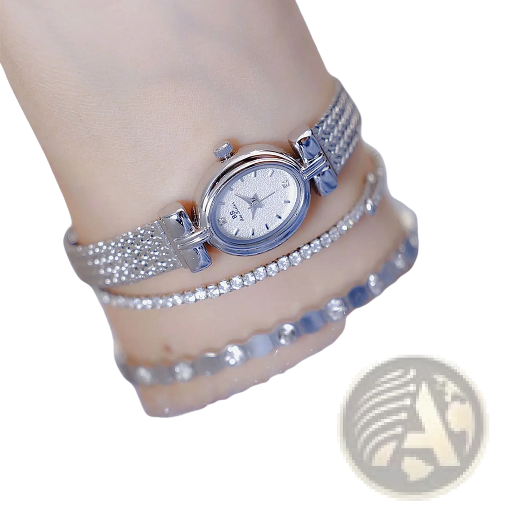 Vintage mesh bracelet watch with diamond accents featuring a delicate silver-toned sparkling mesh band and crystal face