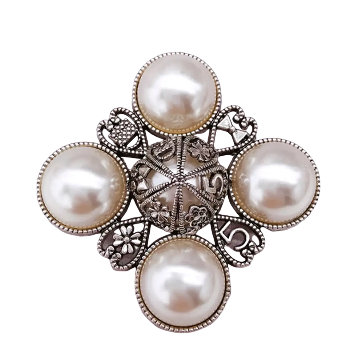 Vintage pearl rhinestone designer brooch in silver tone with five cream pearls arranged in floral filigree pattern
