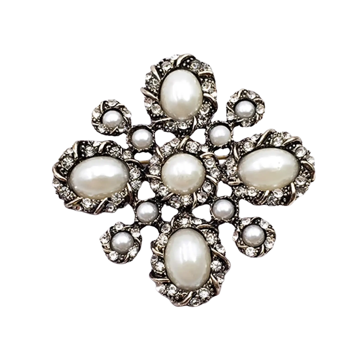 Vintage pearl rhinestone designer brooch featuring five oval pearls set in ornate silver-toned metal with crystal accents