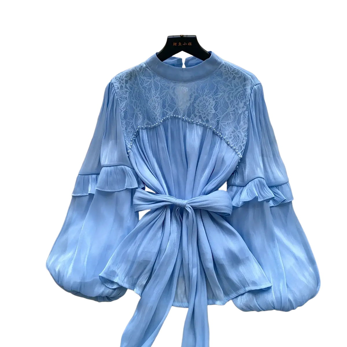 A light blue vintage puff sleeve blouse with lace detailing, high neckline, ruffled cuffs, and waist tie for Y2k streetwear