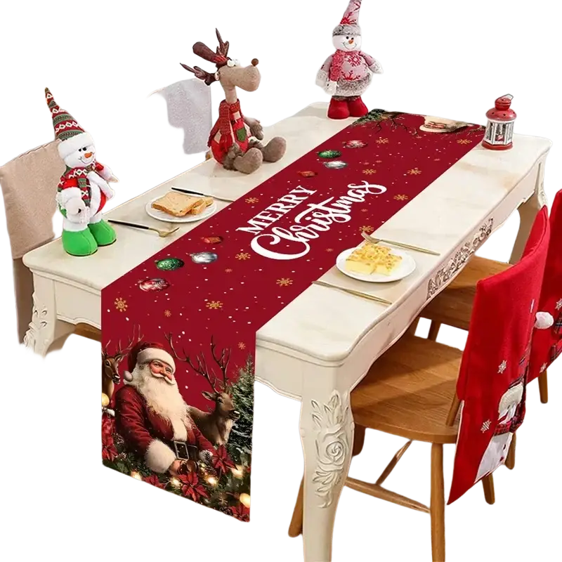Red christmas-themed table runner with vintage santa claus reindeer snowflakes in rustic farmhouse style design