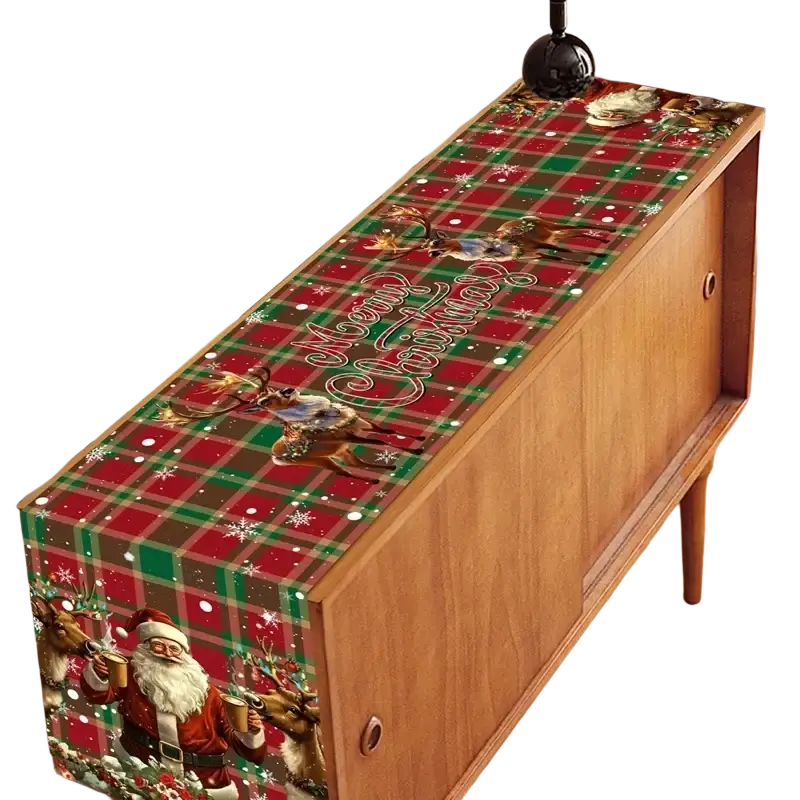 Red green and brown plaid christmas table runner with santa claus and reindeer illustrations in rustic farmhouse style