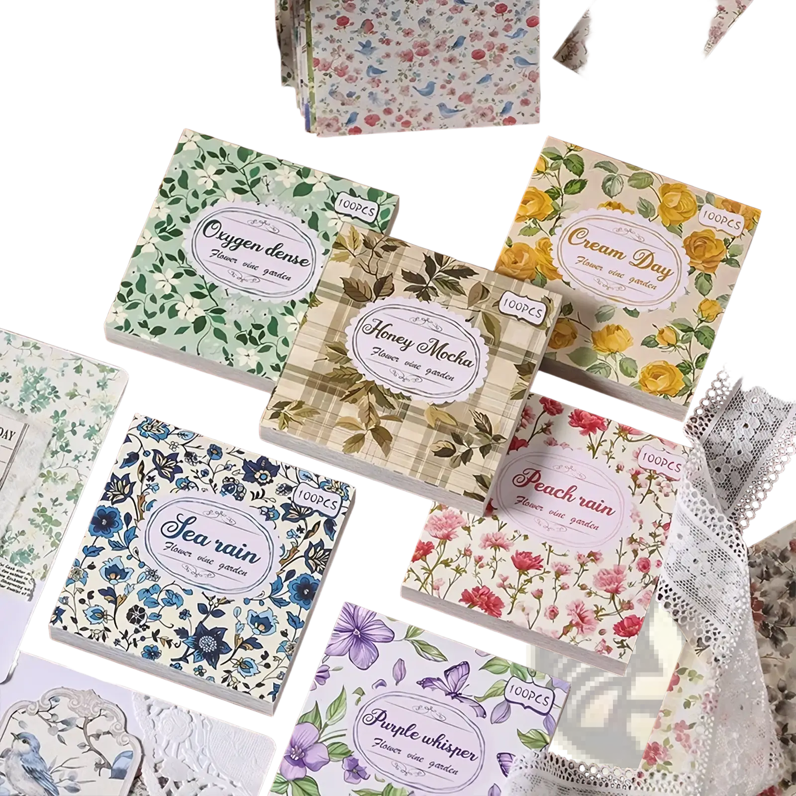 A collection of floral-themed sticky note pads in various colors with botanical designs for vintage scrapbooking and journaling