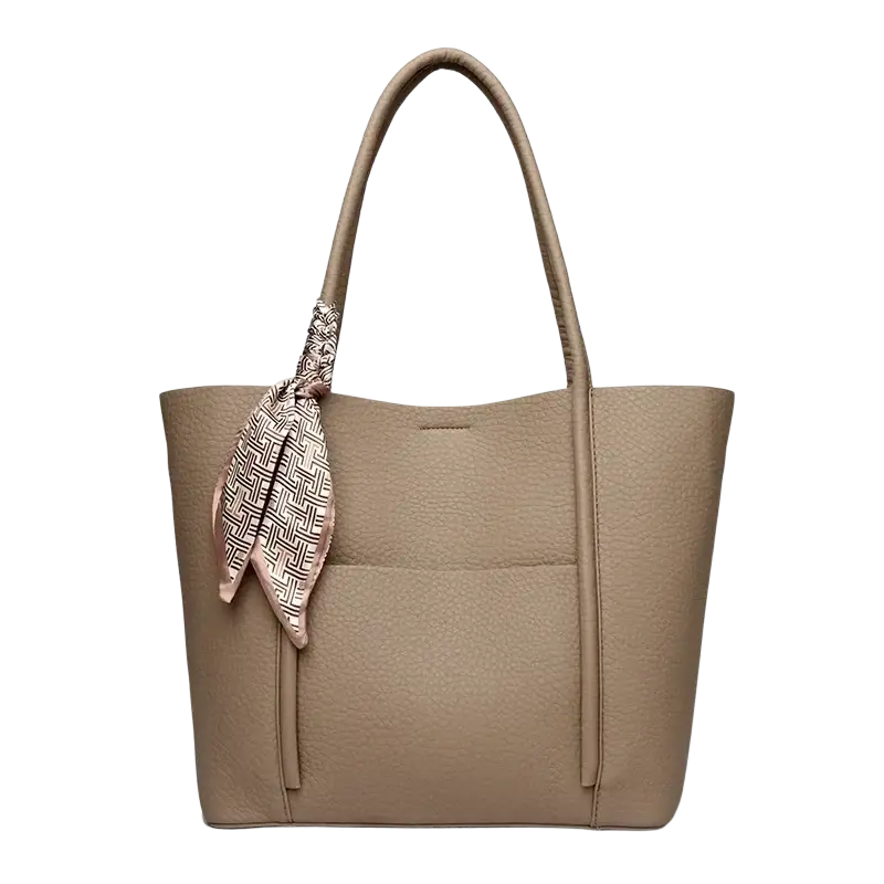 Beige textured soft leather vintage shoulder bag tote with a patterned silk scarf tied to one handle