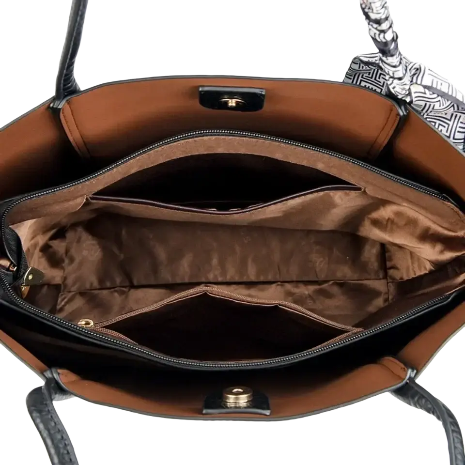 Brown leather vintage shoulder bag large soft tote with black handles and gold-tone hardware for everyday use