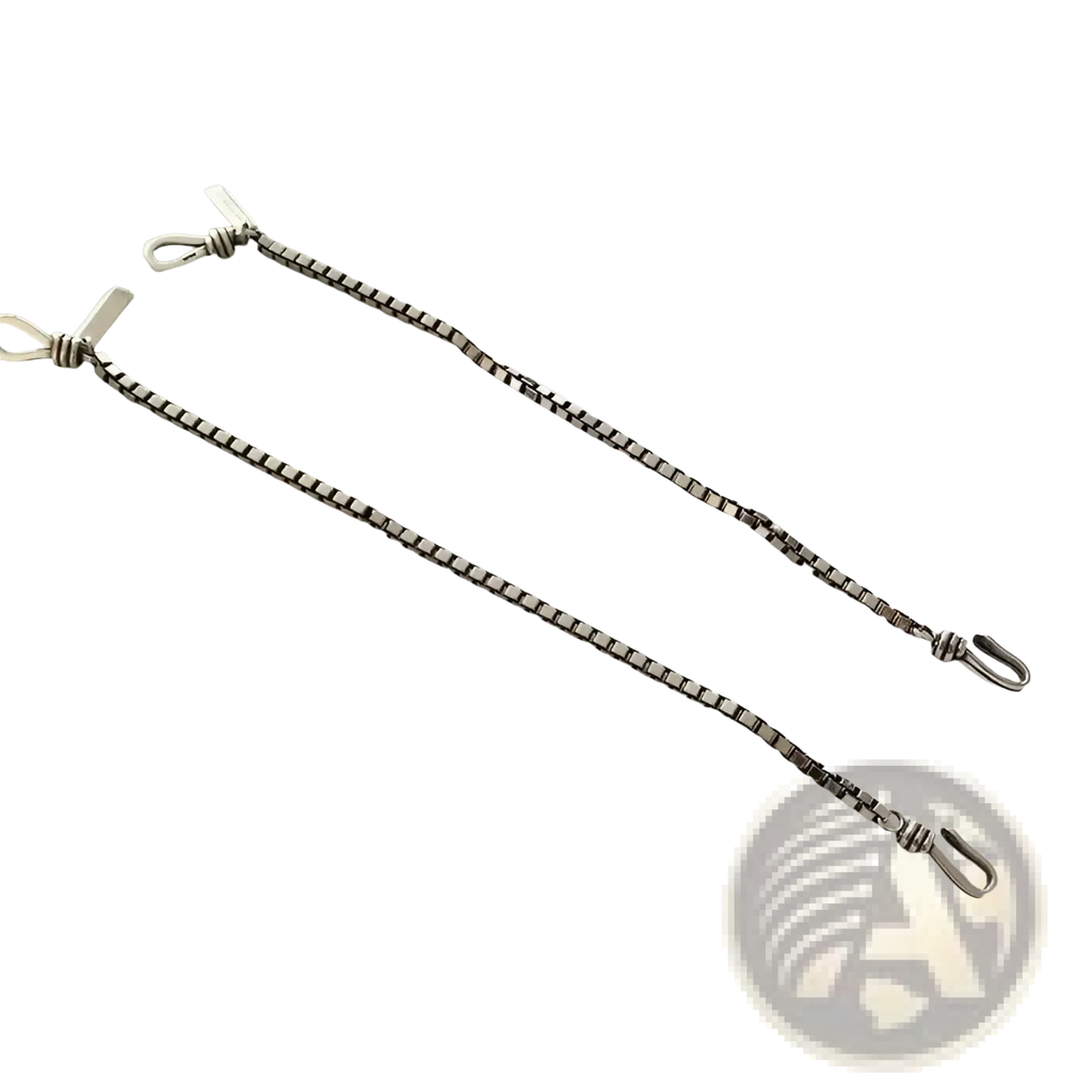 Vintage silver box chain cross bracelet with engraved tag showing silver box-link chain and small hooks at each end