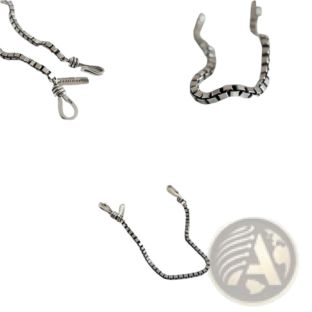 Vintage silver box chain cross bracelet featuring a silver-toned interlocking design and a small engraved tag