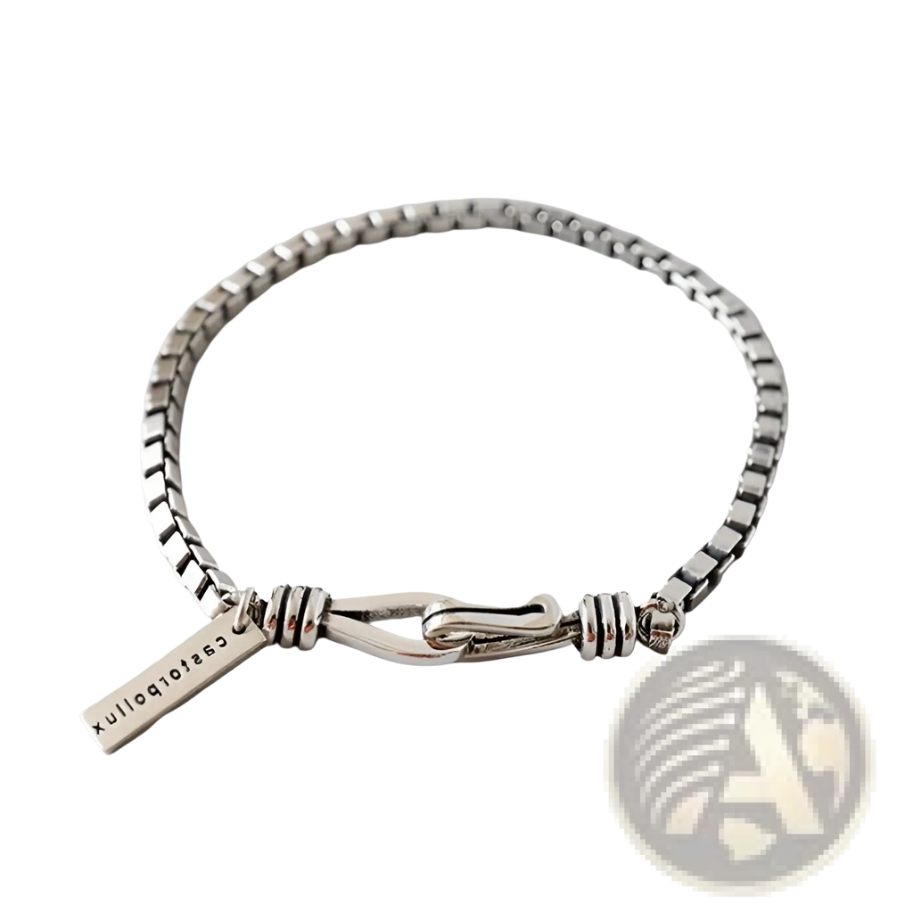 Vintage silver box chain cross bracelet with silver-toned minimalist design and engraved tag reading casa to allux