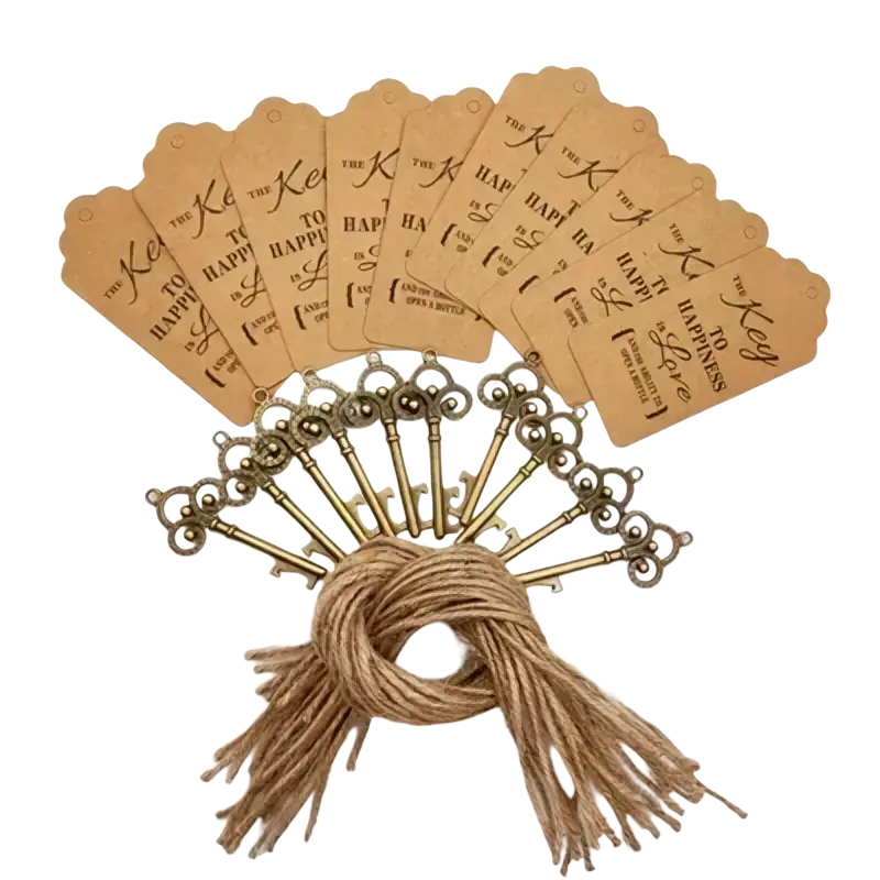 A set of vintage brass skeleton key bottle openers tied with natural jute twine and kraft paper tags for wedding favors