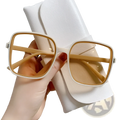 White-framed vintage square sunglasses with tan gradient lenses offering uv protection and modern fashion design