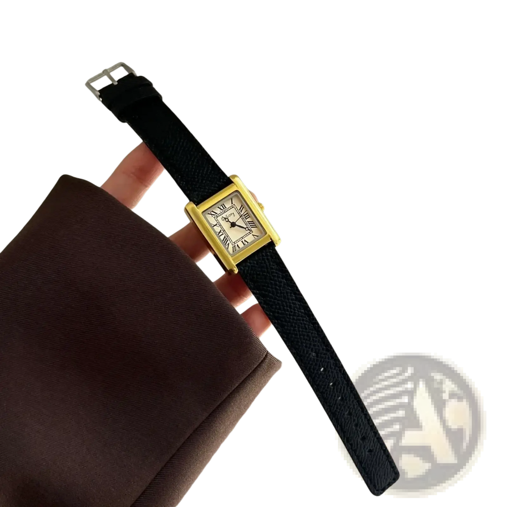 Vintage square quartz watch for women with a gold-toned rectangular case and black textured leather strap with roman numerals
