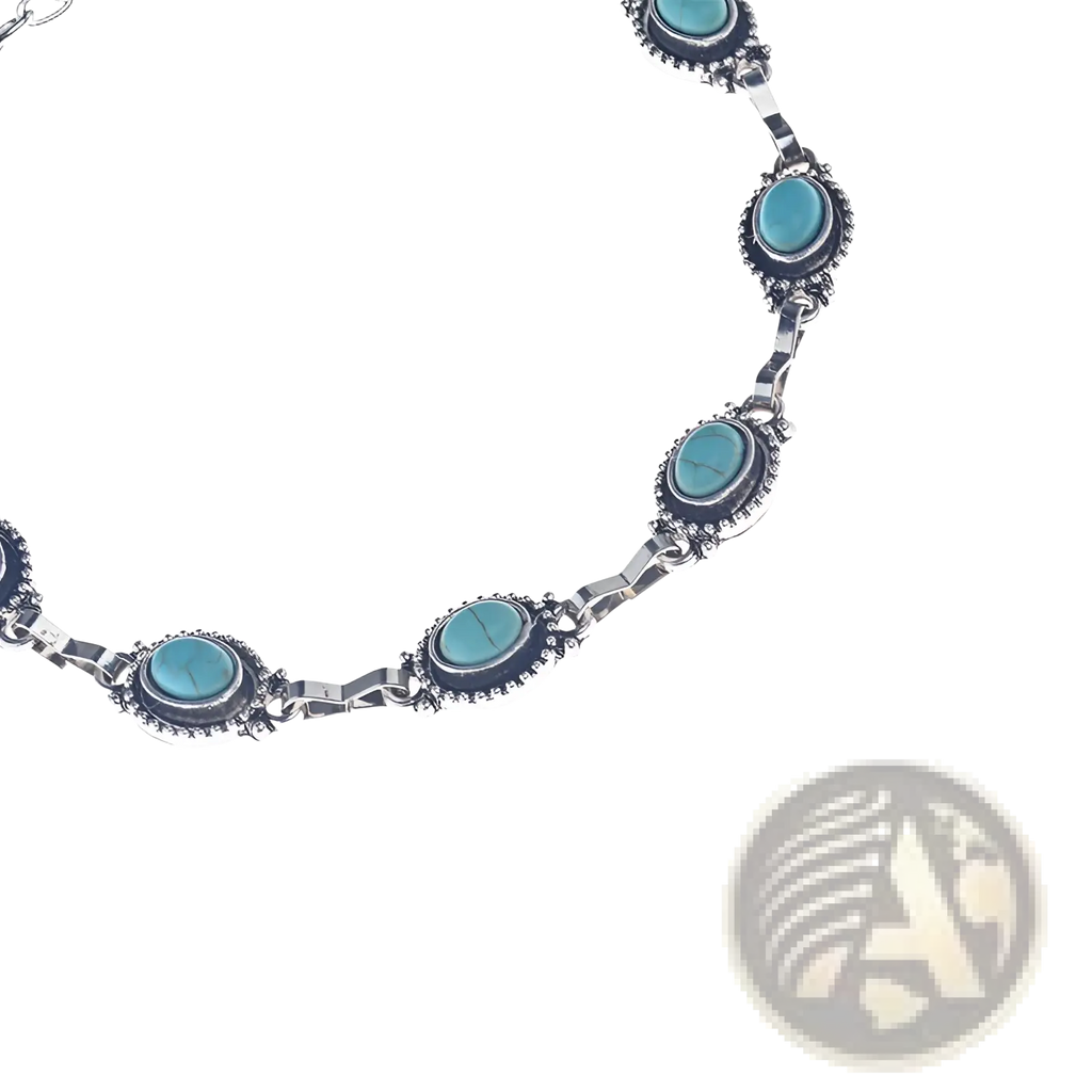 Vintage turquoise silver ornate boho anklet with silver-toned bracelet featuring oval turquoise stones in darkened bezels