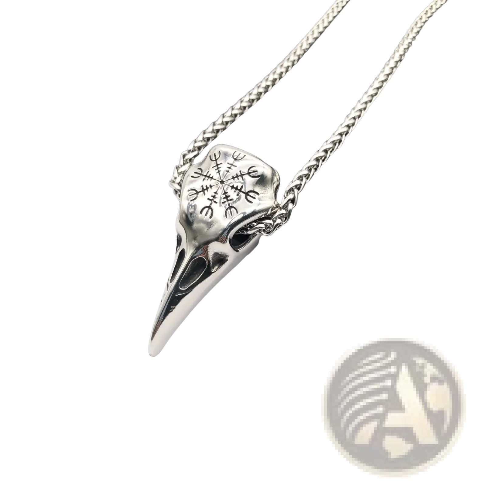 Silver vintage viking runic raven skull pendant necklace with intricate engravings on a braided chain