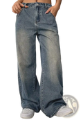 Wide-leg denim jeans in faded medium-blue wash with subtle whiskering and frayed hems vintage washed style