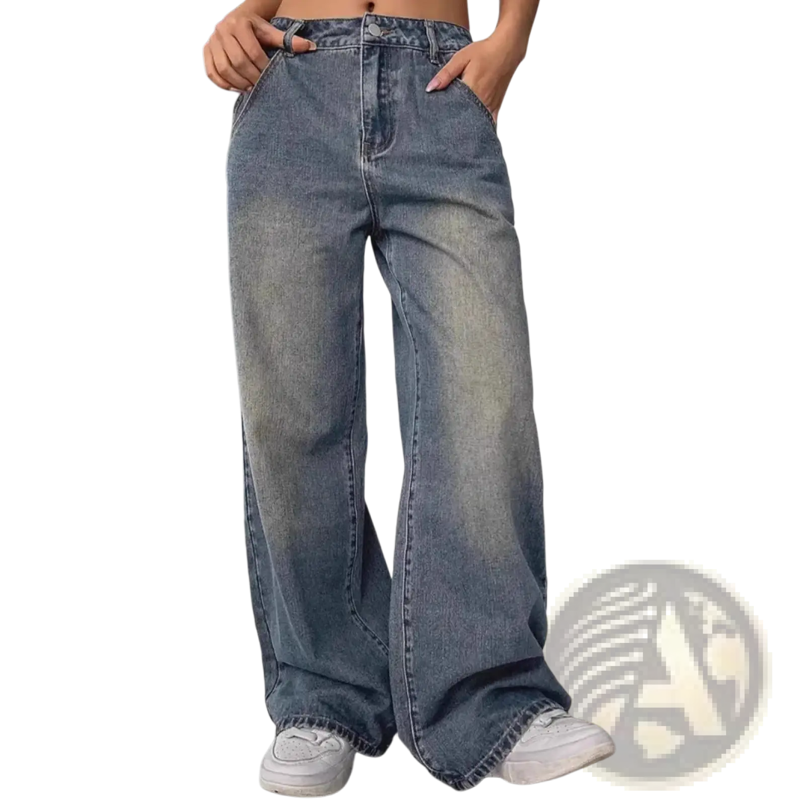 Vintage washed wide leg denim jeans in faded blue wash with subtle distressing and raw hem detailing