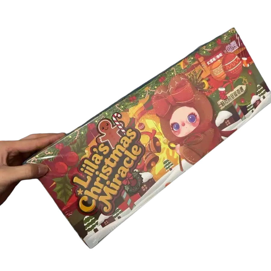 A festive vinyl doll Christmas adventure blind box pendant with a cartoon character and holiday-themed packaging