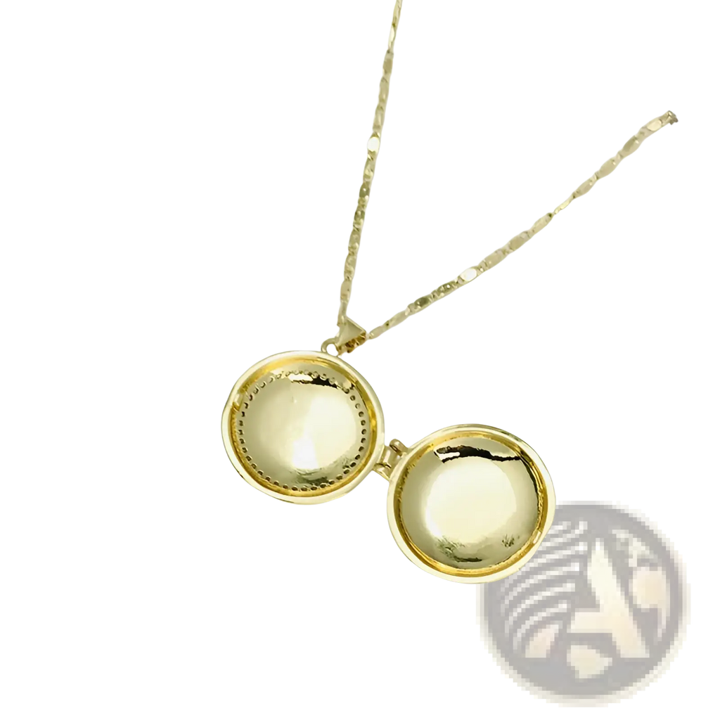Gold-toned circular Virgin Mary locket necklace with hinged design textured edge and inlaid crystals