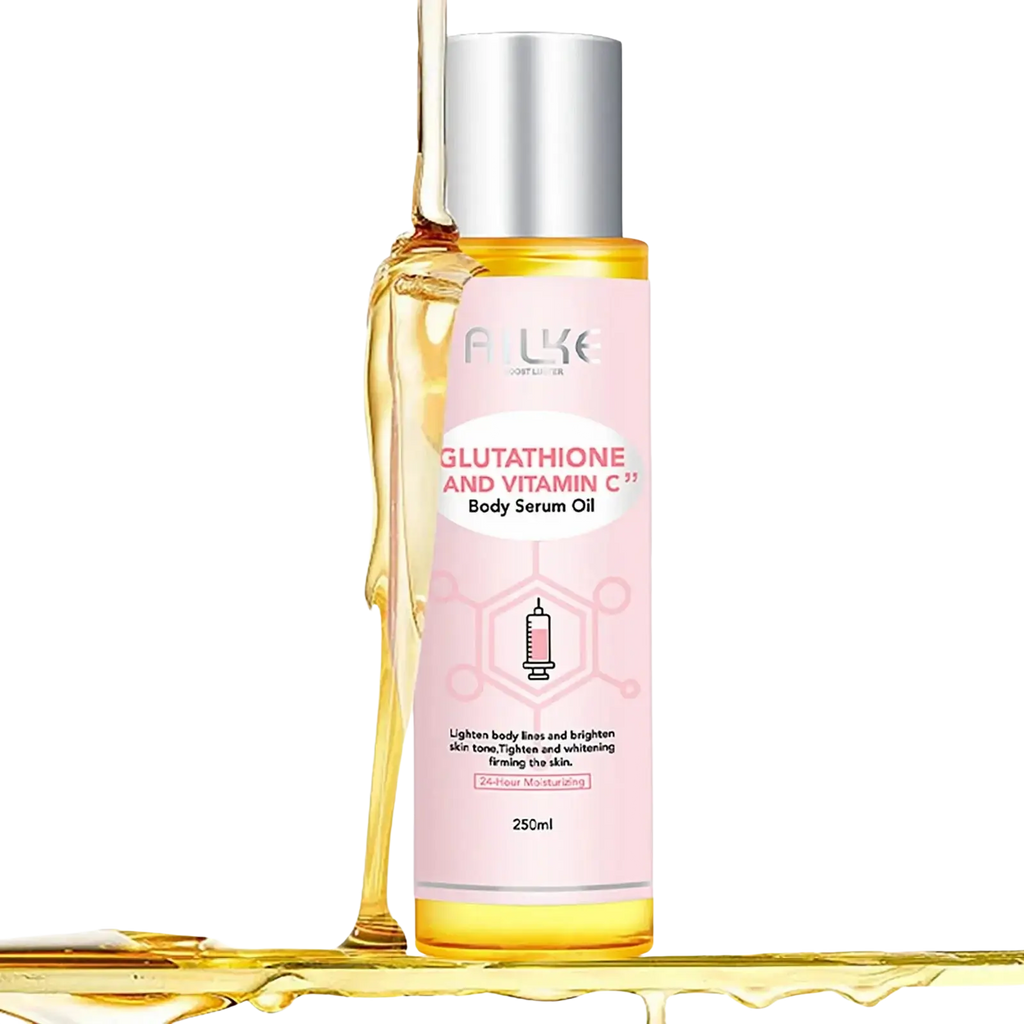 A pink-labeled bottle of alke glutathione and vitamin c essential oil with silver cap containing golden-yellow serum for smooth skin care