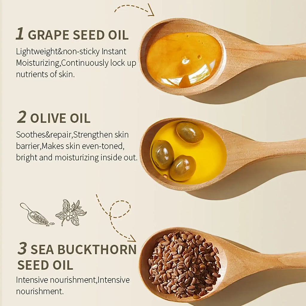Three wooden spoons with grape seed oil, olive oil with olives, and sea buckthorn seeds for vitamin c body essential oil smooth skin care