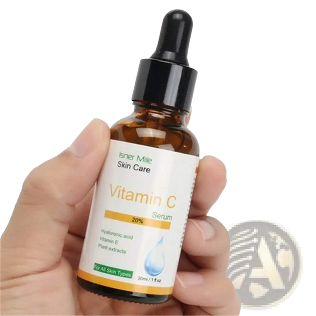 A 30ml amber glass bottle of Isner Mille vitamin C serum with black dropper and white label with gold accents