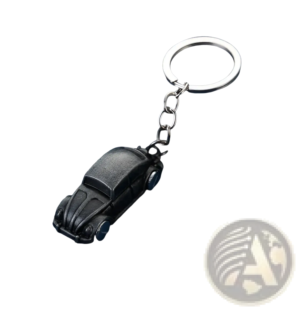 Black vintage-style Volkswagen Beetle metal car keychain with silver metal ring and chain for keys