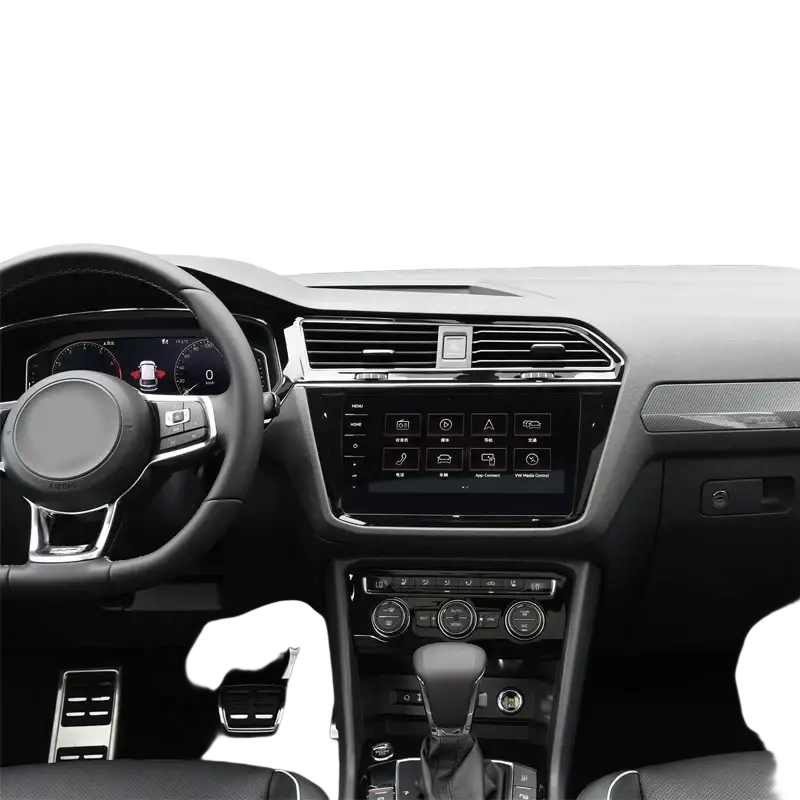 Black leather steering wheel with silver trim and central control knob in volkswagen tiguan wireless car charger setup