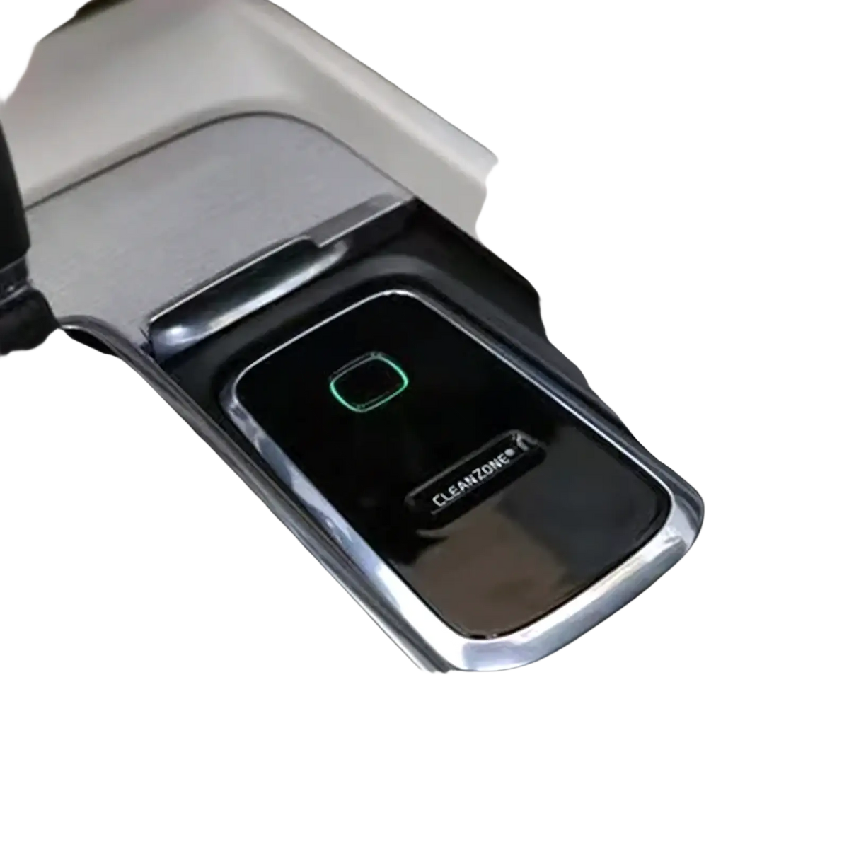 Black rectangular Volvo Cleanzone wireless car charger and air purifier with chrome trim and glowing green indicator