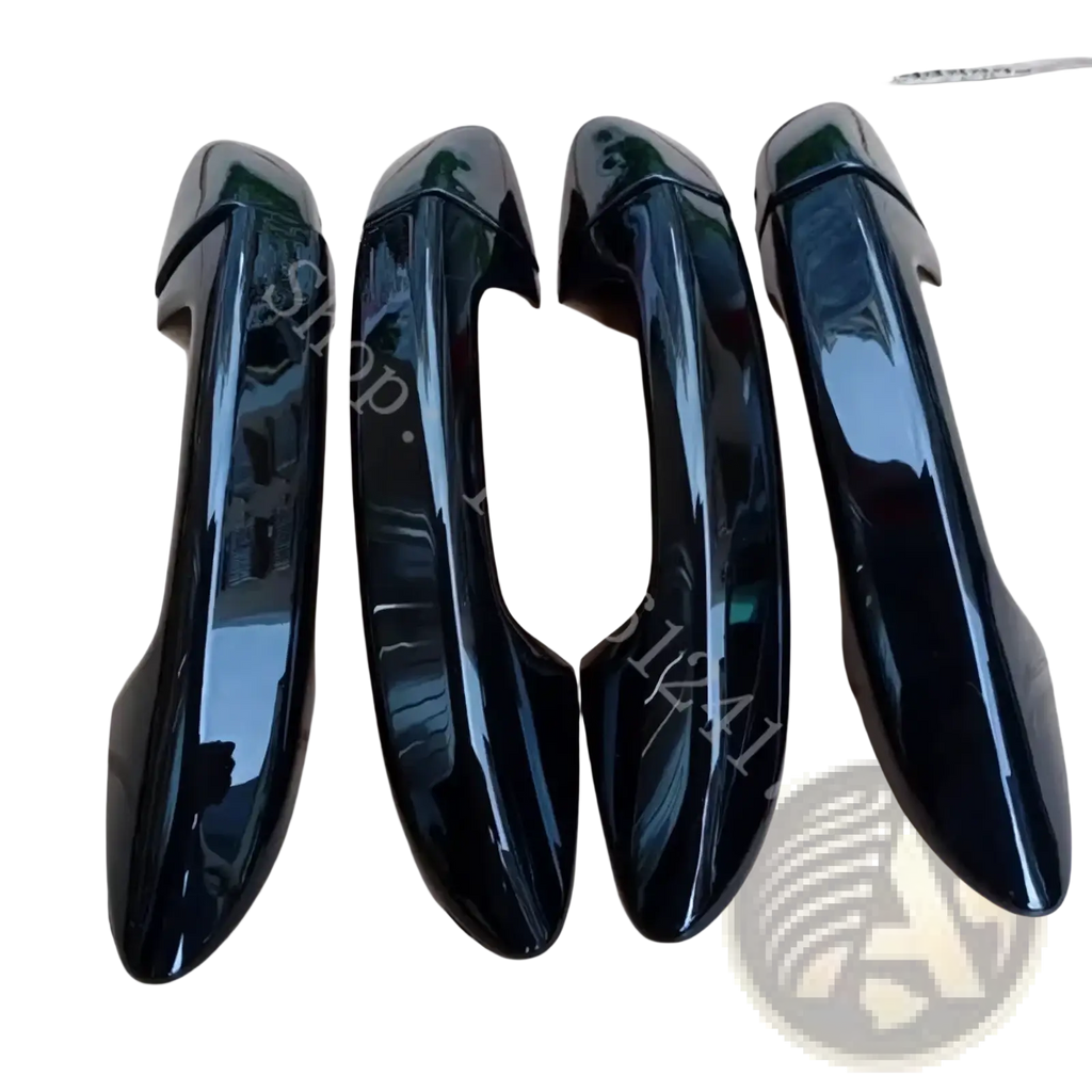 Four glossy black plastic door handle covers with a sleek modern design for vw passat carbon fiber trim