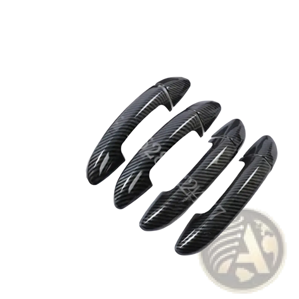 Set of four black carbon fiber textured vw passat door handle cover trims shown from the front side