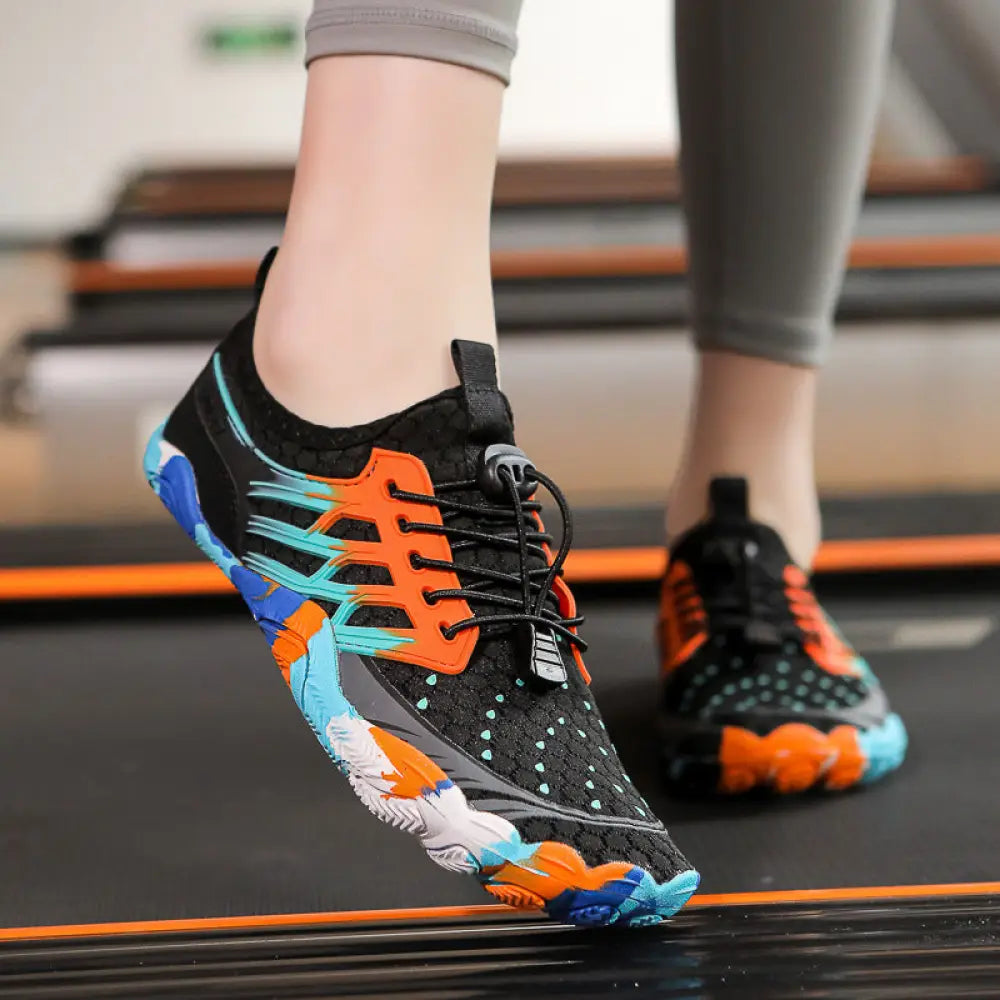 Breathable quick dry mesh water sports shoes in black orange and blue with toe-separated design and rubber sole