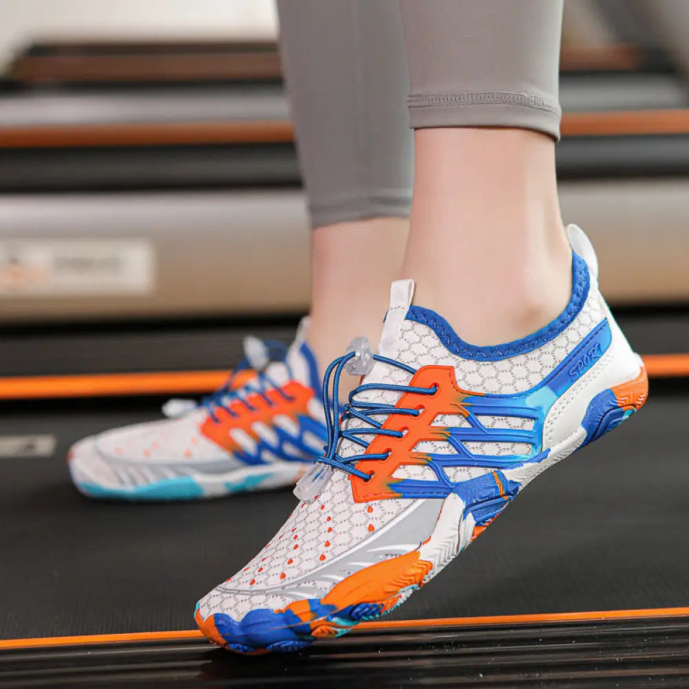 Breathable quick dry mesh water sports shoe with vibrant orange and blue accents and a white mesh upper