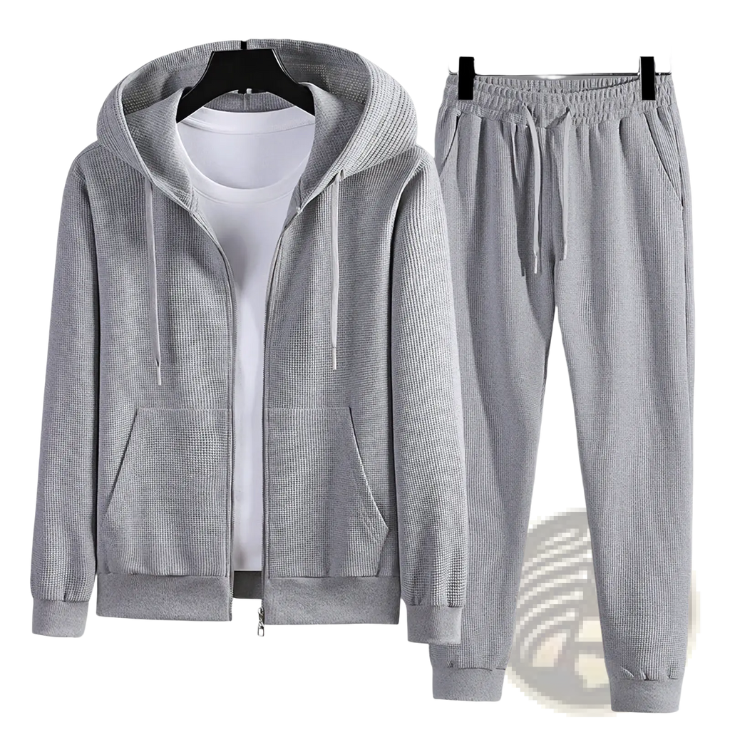 Gray textured waffle zip-up hoodie and matching joggers set made of breathable sportswear fabric for athletic use