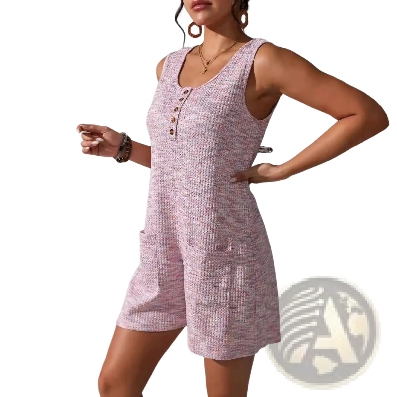 A pink waffle knit sleeveless romper with button front neckline and side pockets