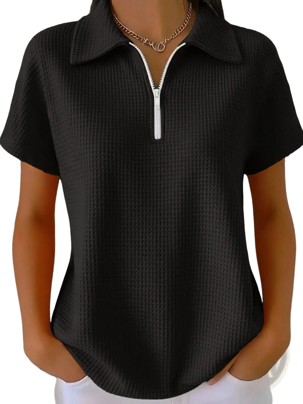 Black waffle knit half zip short sleeve polo shirt with ribbed texture and white zipper pull and collar detail