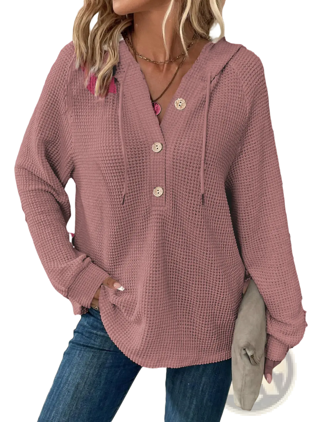 A soft dusty rose waffle knit v neck button front hoodie with three wooden buttons and hood drawstrings