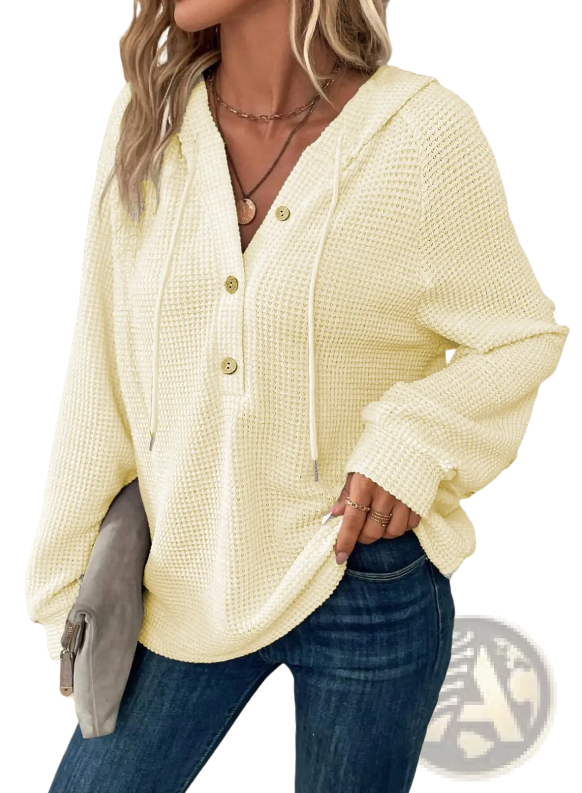 A soft pale yellow waffle knit v neck hoodie with button front detail and relaxed fit for casual wear