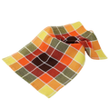 A vibrant multicolored waffle weave kitchen dish cloth in orange yellow green and brown for absorbent drying
