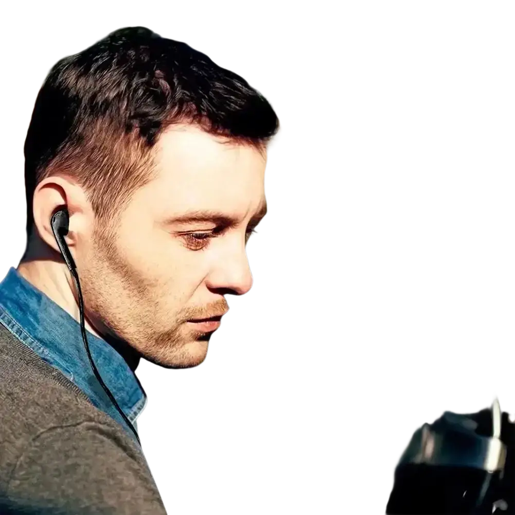 Black walkie talkie single sided mono earphone with thin cable worn by man featuring 3.5mm jack