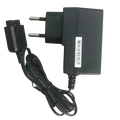 Black plastic wall charger for motorola tetra radio with european two-pin plug and coiled black cable