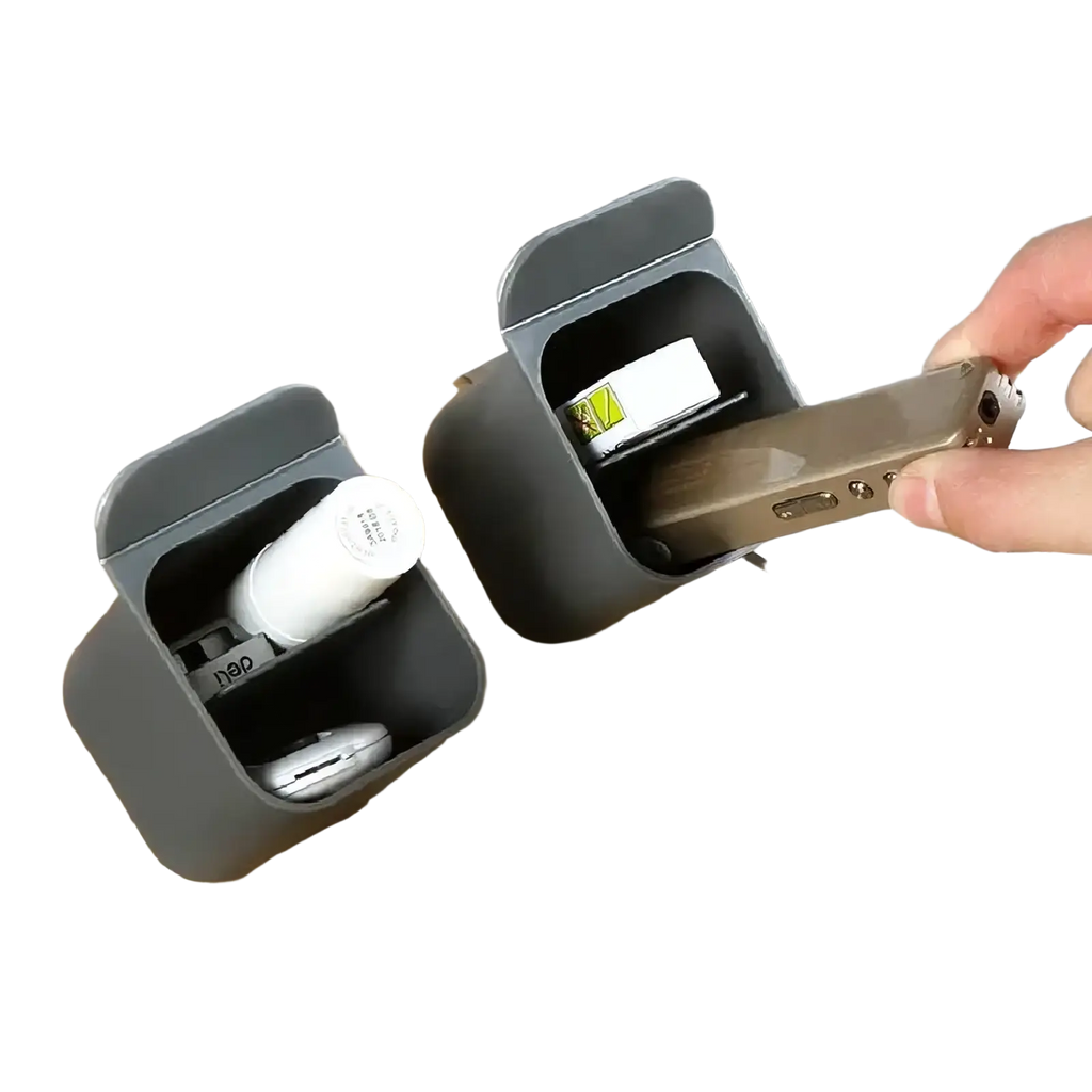 Gray plastic wall mounted desk organizer storage box with hinged lid designed to hold keys and usb drives