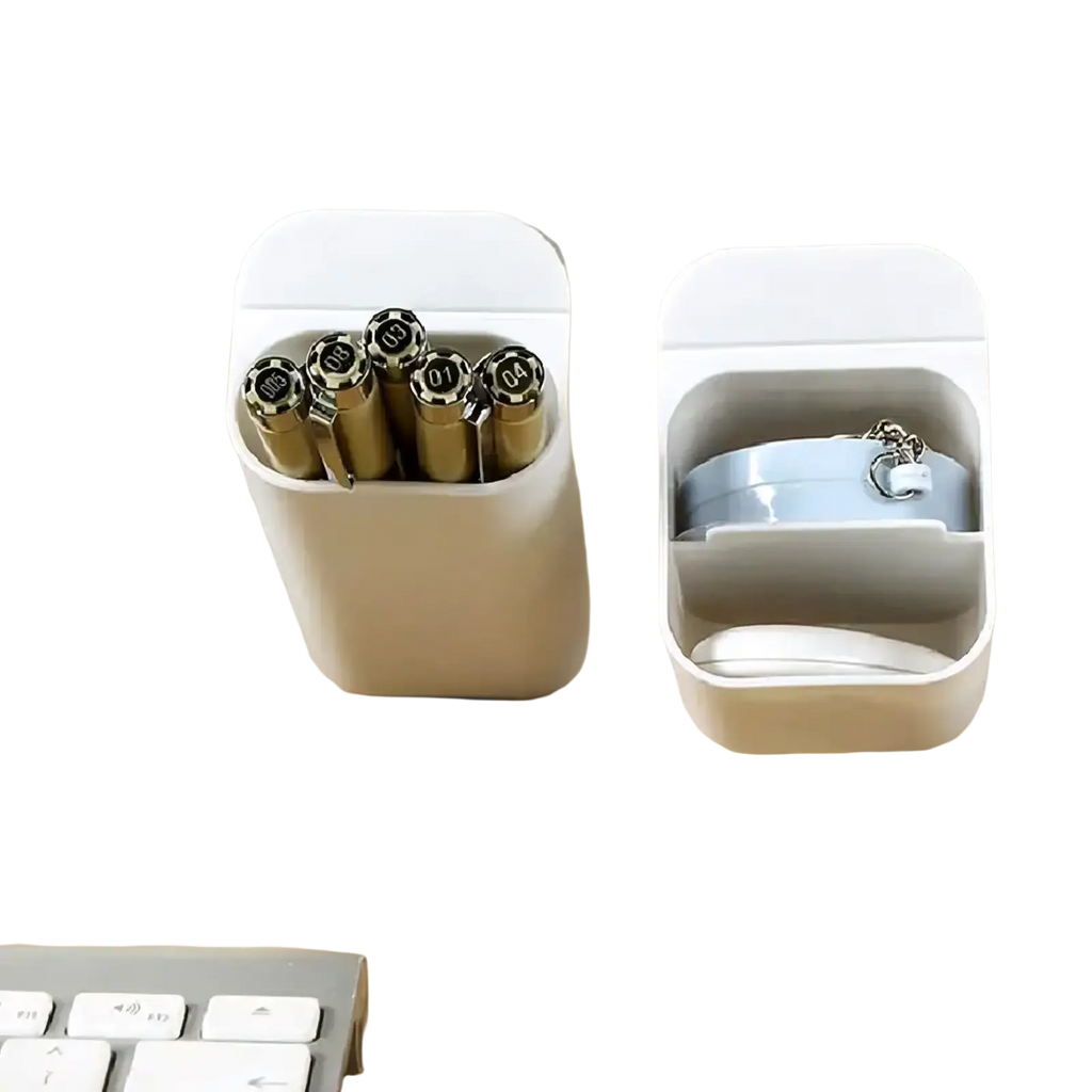 White wall mounted desk organizer storage box holding gold pens and a light blue keychain for office use